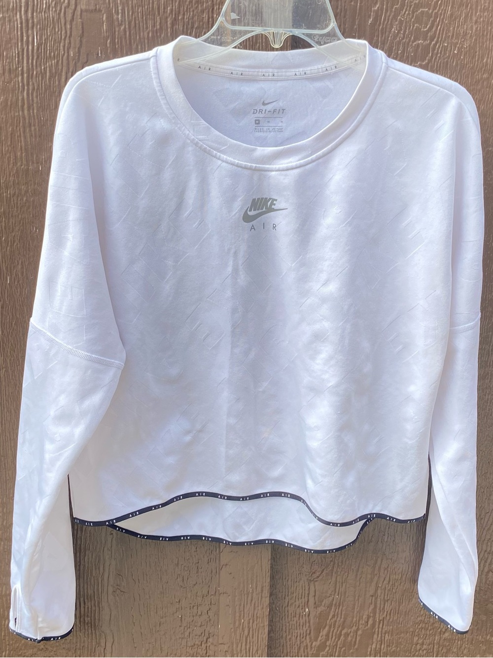 Nike White Dri-FIT Long Sleeve Crop Top with Subtle Logo
